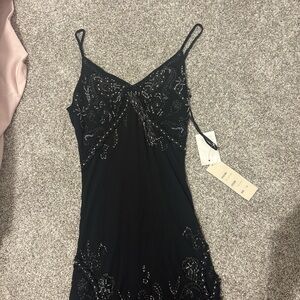 Black Dress with Silver Accents